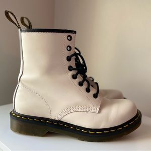 Doc Martens style 11821 bright white boots with black trim and laces . US size 7